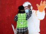 mural-covid-19-hiasi-kolong-tol-dalam-kota_20201204_183126.jpg