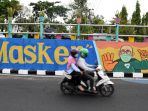 mural-imbauan-bermasker-hiasi-viaduk-di-kawasan-ketabang-kali_20201018_222115.jpg