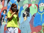 mural-selamatkan-bumi-kita-dari-corona-di-kota-bandung_20201206_221731.jpg