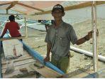 nelayan-mamboro-pinjam-perahu.jpg
