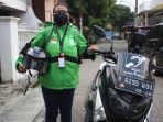 ni-luh-putu-erine-s-wanita-driver-ojol-disabilitas-tuna-runggu_20211021_151700.jpg