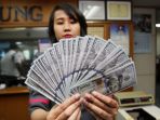nilai-tukar-dollar-masih-menguat-di-angka-14904_20180906_191823.jpg