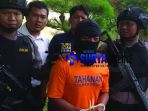 nur-kholik-tersangka-pembunuhan-yang-mayatnya-dikubur_20180521_145220.jpg