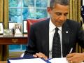 obama-tulis-surat.jpg