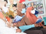 ojk-dan-indah-kurnia-gelar-edukasi-bahaya-pinjol-ke-masyarakat_20211216_012702.jpg