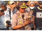 oknum-polwan-ketika-melakukan-klarifikasi-tentang-pengiriman-miras.jpg