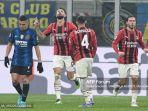 olivier-giroud-dari-ac-milan-melakukan-selebrasi.jpg
