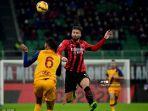 olivier-giroud-saat-beraksi-dalam-laga-melawan-as-roma.jpg