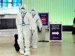 omicron-pakaian-hazmat-bandara-internasional-los-angeles.jpg