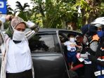 operasi-patuh-masker-di-depan-taman-bungkul-surabaya_20200709_192628.jpg