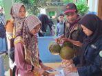 orangtua-siswa-saat-datang-mendaftarkan-anaknya-ke-mts-pakis.jpg