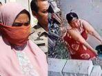 p-ingat-masriah-viral-emak-emak-siram-air-tinja-ke-rumah-tetangga-berulah-lagi-usai-keluar-penjara.jpg