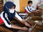 pabrik-rokok-gajah-baru-serap-tenaga-kerja-lokal_20230205_192439.jpg