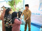 HUT Ke-15 BNPP, Mendagri selaku Kepala BNPP Bagikan 2.000 Paket Sembako kepada Warga Tanah Tinggi