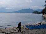 pantai-kinunang-dengan-pemandangan-gunung-dua-saudara.jpg