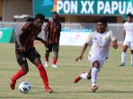 papua-lawan-aceh-di-babak-6-besar-sepak-bola-pon-xx_20211006_173252.jpg
