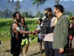 papua-tradisi-bakar-hanoi-ilaga.jpg