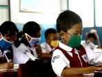 para-pelajar-menggunakan-masker-agar-terhindar-dari-ispa_20150915_155609.jpg