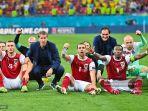 para-pemain-austria-merayakan-kemenangan-setelah-memenangkan-pertandingan.jpg