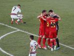 para-pemain-belgia-merayakan-kemenangan-saat-penyerang-portugal-cristiano-ronaldo.jpg