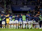 para-pemain-fc-porto-berkumpul-setelah-pertandingan-sepak-bola-grup-h-liga-champions.jpg