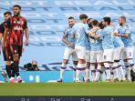 para-pemain-manchester-city-merayakan-gol-2.jpg