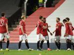 para-pemain-manchester-united-merayakan-gol-kedua-mereka.jpg