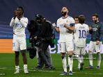 para-pemain-real-madrid-melambai-kepada-pendukungnya-pada-akhir-pertandingan-lawan-chelsea.jpg