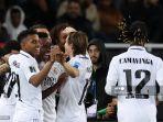 para-pemain-real-madrid-merayakan-gol-kelima-dalam-final-piala-dunia-antarklub.jpg