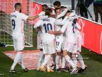 para-pemain-real-madrid-merayakan-gol-yang-dicetak-oleh-carvajal.jpg