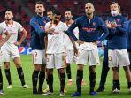para-pemain-sevilla-bereaksi-pada-akhir-pertandingan-sepak-bola-piala-super-uefa.jpg