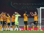 para-pemain-wolves-merayakan-kemenangan-1-2-dari-arsenal.jpg