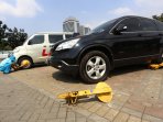 parkir-liar-di-jakarta-masih-marak_20150526_000408.jpg