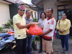 partai-golkar-membagikan-bantuan-sembako-kepada-masyarakat.jpg
