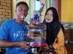 pasangan-asal-ponorogo-aris-prasetyo-dan-eka-maria-fransisca-menunjukka.jpg