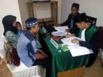 pasangan-nikah-masal-di-melawi_20150423_143035.jpg
