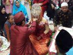 pasangan-pengantin-harus-ijab-kabul-di-kantor-polisi-gegara-mempelai-pria-maling-motor.jpg