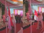 pasangan-pengantin-kibarkan-bendera-saat-resepsi.jpg
