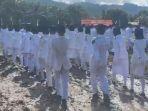 paskibra-di-perbatasan-ri-malaysia-bertugas-di-kubangan-lumpur.jpg