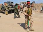 pasukan-irak-serang-isis_20150311_061911.jpg