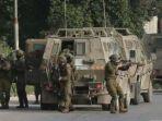 pasukan-pendudukan-israel-idf-dalam-posisi-siaga-di-sebuah-jalanan-di-tepi-barat.jpg