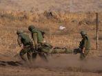 pasukan-pendudukan-israel-idf-mengevakuasi-rekan-mereka.jpg