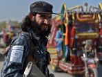 pasukan-taliban-berperan-sebagai-polisi-afghanistan_20211006_201420.jpg