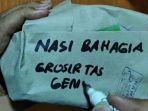 pasutri-yang-viral-membagikan-nasi-bungkus-berisikan-uang-rp-1-juta.jpg