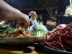 pedagang-sayuran-mengeluhkan-kenaikan-harga-sejumlah-sayuran_20210105_173342.jpg
