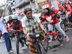 Gaungkan Semangat Persatuan, Ribuan Pesepeda Gowes Serentak di 63 Kota