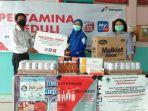 peduli-covid-19-pertamina-serahkan-bantuan-apd-dan-obat-obatan-untuk-puskesmas-guntung-payung.jpg