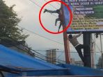 pekerja-pemasangan-reklame-tergantung-usai-kesetrum_20171030_154311.jpg