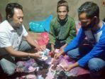 pelaku-dan-barang-bukti-untuk-alat-praktik-penggandaan-uang.jpg