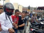 pelaku-lamhot-damanik-saat-diamankan-polisi.jpg